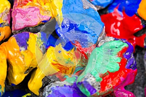 bright colored stones with paint