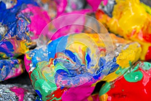 bright colored stones with paint