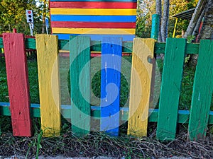 bright and colored wooden fence in the playground