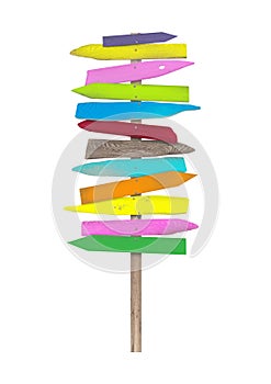 Bright colorful blank wooden directional beach signs on pole photo