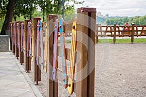 Bright colorful fence in the playground in the form of a pencil. The safety of children during the games