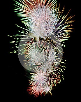 Bright and colorful fireworks isolated on a black background.