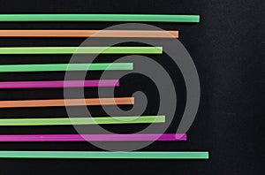 Bright colorful plastic straws line pattern artistic design