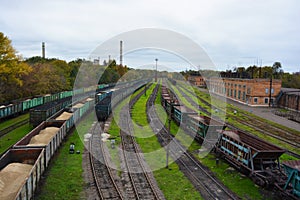 A bright and colorful railway freight station located in the Rechport area of the city of Kamenskoye.