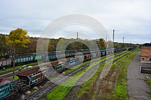 A bright and colorful railway freight station located in the Rechport area of the city of Kamenskoye.