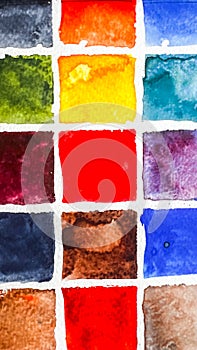 Bright colorful watercolor swatch on paper. Aquarelle color chart. Mixing watercolours. Yellow green red violet