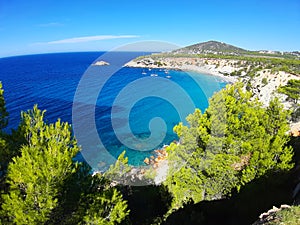 Bright colors of the wild nature of the bay of Cala d`hort in ibiza in summer