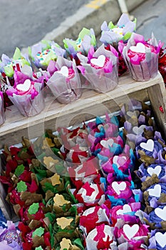 Bright colourful cupcakes on a table stand