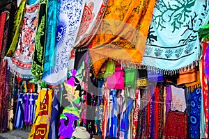 Bright colourful multicolored Arabian, Turkish, oriental traditional babushka shawls, rugs