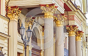 Bright columns of the building, Old courtyard, gilded cola