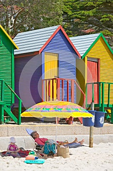 Bright Crayon-Colored Beach Huts at St James, False Bay on Indian Ocean, outside of Cape Town, South Africa