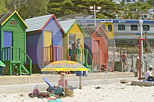 Bright Crayon-Colored Beach Huts at St James, False Bay on Indian Ocean, outside of Cape Town, South Africa