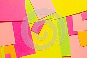 Bright crumpled multi-colored stickers on the office white board photo