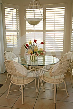 Bright dining room with shutters