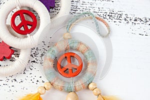 Bright dream catcher with an orange peace sign