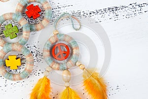 Bright dream catcher with an orange peace sign