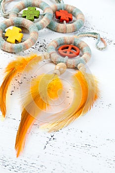 Bright dream catcher with an orange peace sign