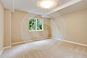 Bright empty bedroom in light ivory tone