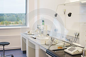 Bright empty office in a scientific medical laboratory equipped with modern measuring equipment and special devices.