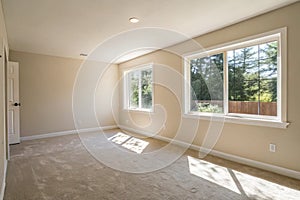 Bright empty room and blank wall