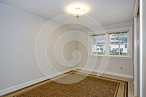 Bright empty room with pure white walls