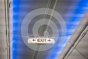 Bright exit sign in the modern jet plane
