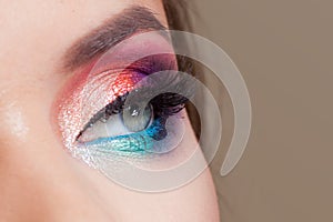 Bright eye makeup. Pink and blue color, colored eyeshadow.