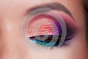 Bright eye makeup. Pink and blue color, colored eyeshadow.