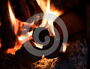Firewood burns in fireplace of high temperature