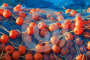 Bright fishing net with floats closeup