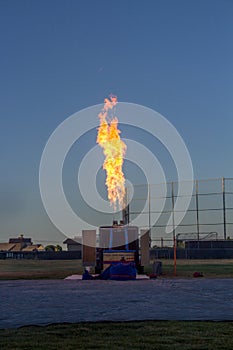 A bright flame from a propane gas engine is shooting into the air