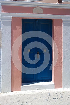 Bright front door in Oia in Santorini.Vertical view