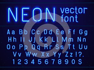 Bright glowing blue neon alphabet letters and numbers font. Nightlife entertainments, modern bars, casino illuminated photo