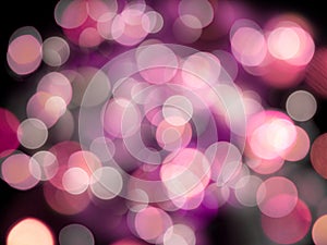 bright glowing lights with a purple blur on a black background abstract