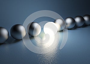 Bright glowing sphere in a row. Leadership concept