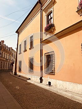 A bright, golden facade in the old market square in TarnÃ³w, Poland - POLSKA - CATHOLIC