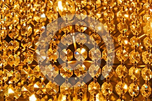 Bright golden gold yellow shiny abstract pattern, close up of de
