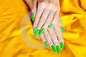 Bright green manicure on real nails