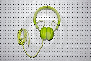 Bright green music headphones for listening to digital music