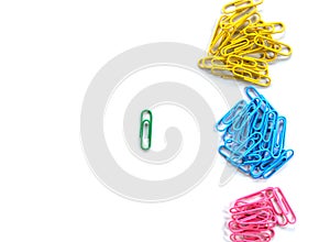 Bright green paper clip unique idea concept