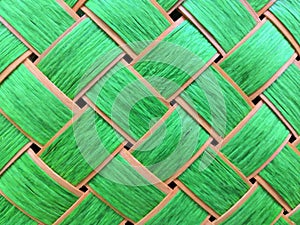 Bright green texture squares in a wicker basket background