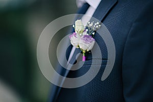 Bright groom boutonniere