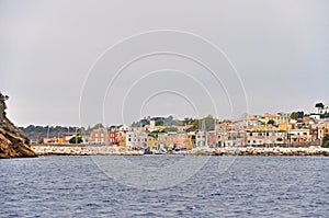 Bright houses the masts of the yachts in Marina on the island of