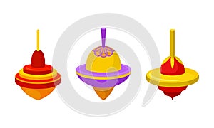 Bright Humming Top or Spinning Top as Squat Toy with Sharp Point at the Bottom Vector Set