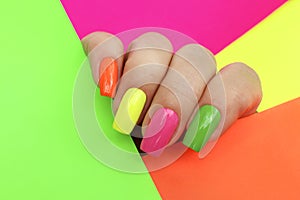 Bright illuminating multicolored fashionable manicure.