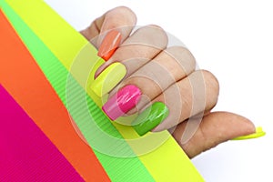 Bright illuminating multicolored fashionable manicure.