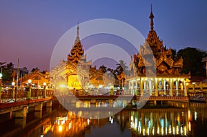 Illumination of Buddhist shrine, Yangon, Myanmar photo