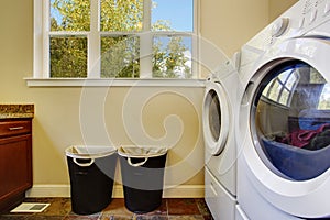 Bright ivory laundry room