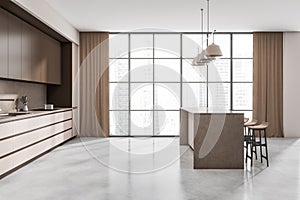 Bright kitchen room interior with brown bar counter, panoramic window