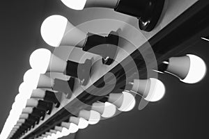 Bright lamps in a row on the make-up mirror for makeup artists and actors